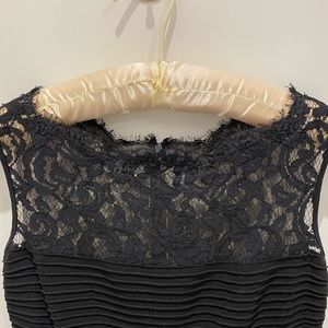 Black cocktail dress with lace details